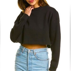 WEWOREWHAT cropped black sweatshirt, size Medium. Rolled hem, boxy, oversized.